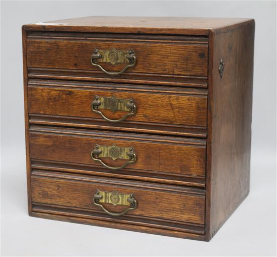 A miniature oak chest